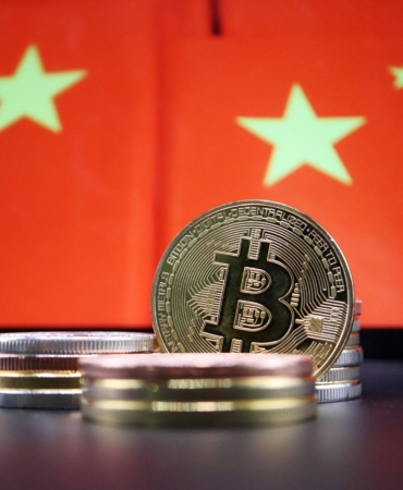 Illustration picture of China flags and Bitcoin cryptocurrency